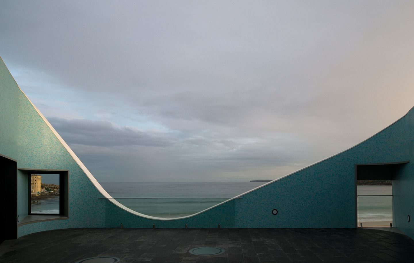 North Bondi Surf Lifesaving Club  Viewing platform a surf lifesaving club looking out over the beach at North Bondi designed by Durbach Block Jaggers Architects