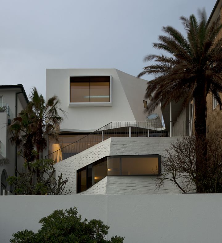 Photography by Andrew Cowen  Sculptural concrete beachfront house located in Tamarama along the Bondi to Coogee walk designed by Durbach Block Jaggers Architects.